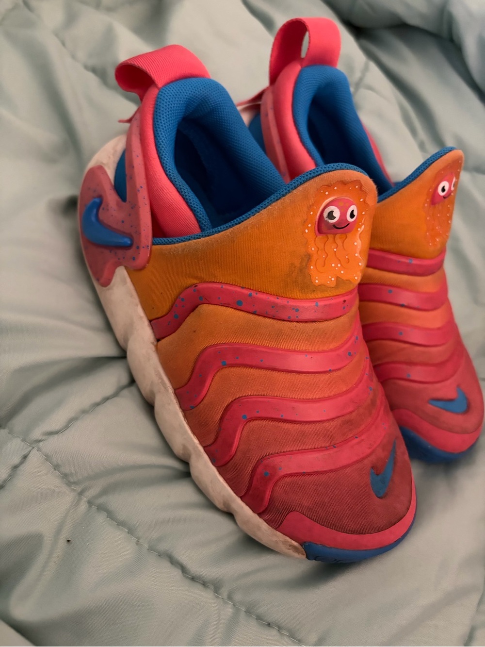 Nike Kids Orange & Pink Slip-On Sneakers with Blue Accents